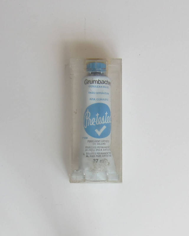 Studio Materials, Unopened clear plastic box with tube of Grumbacher Oil Color in the shade "Cerulean Blue" inside.